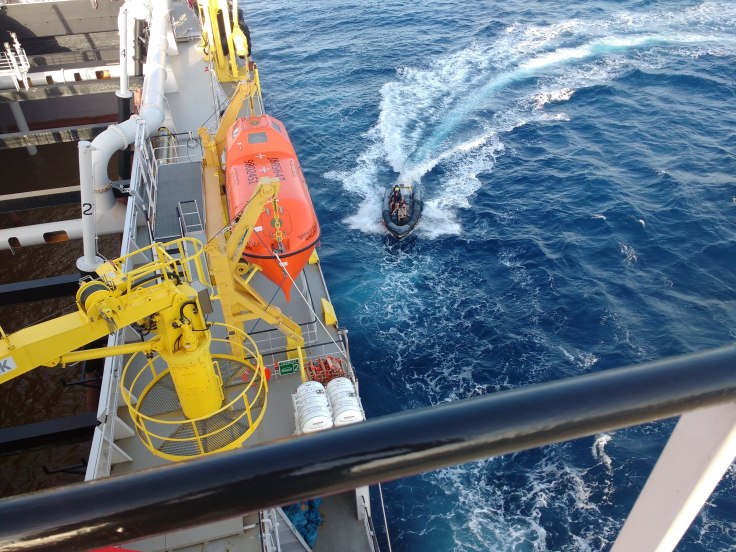 Picking up Security Personnel and weapons. Photo by Ray Penson (1)