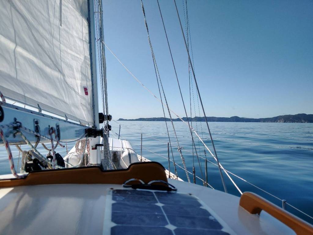 Approaching Cape Jackson on glassy seas. Photo Ray Penson