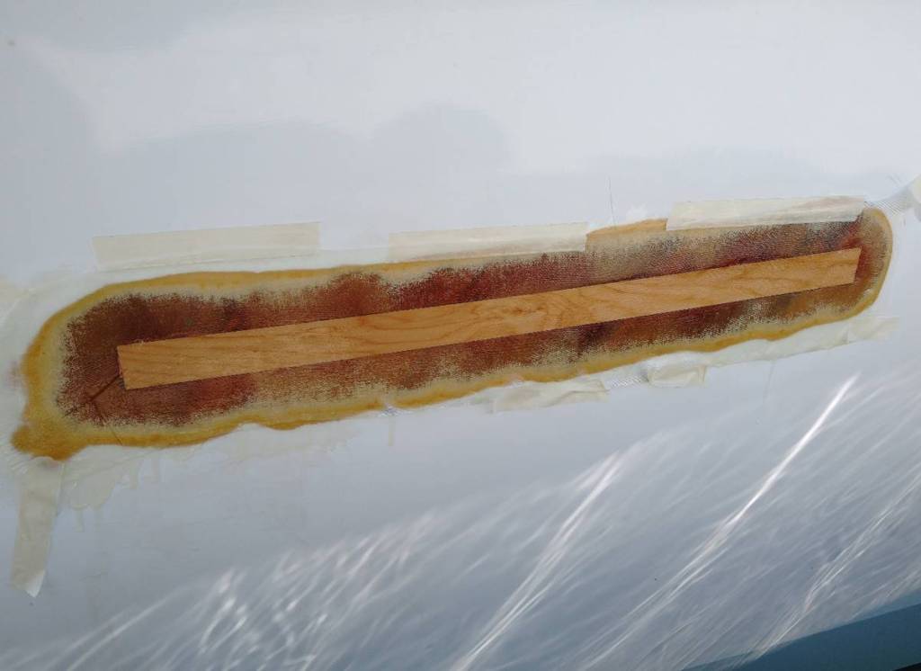 New Red cedar insert glassed over with cloth and epoxy resin. Ray Penson