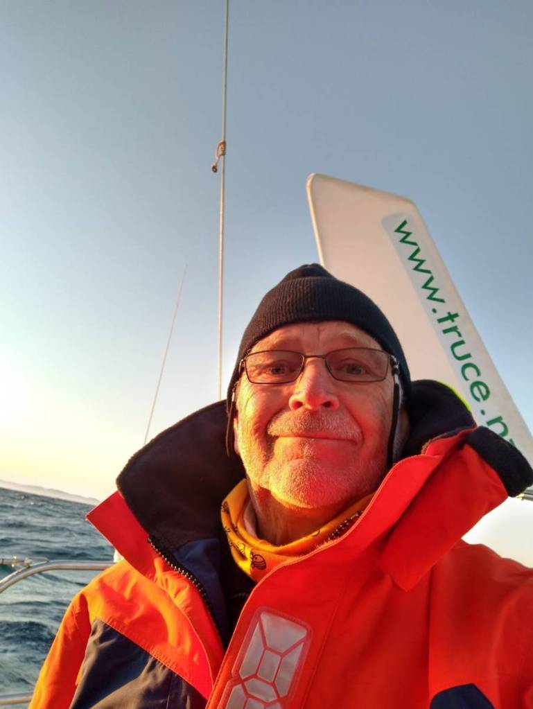 Wrapping up warm for the night sailing down the coast Photo Ray Penson