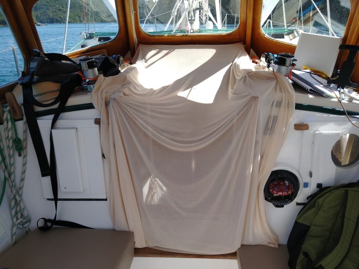 Anti Sandfly screen on companionway. Photo Ray Penson
