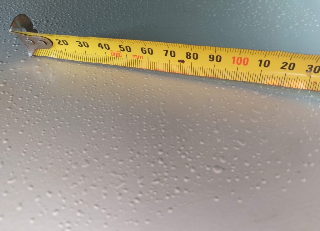 Paint blistering under Solar Panels. Photo Ray Penson