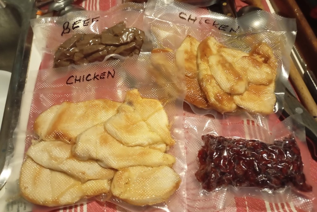 Vacuum packing everything in sight. Photo Ray Penson