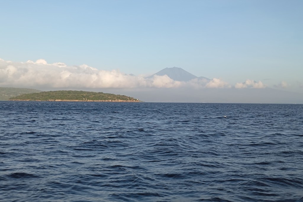 Departing Bali, Mount Ruang on Java in the distance. Photo Ray Penson