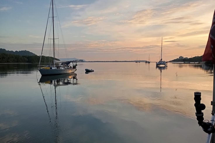 Peaceful sundowners on Santubong River Anchorage. Photo Ray Penson