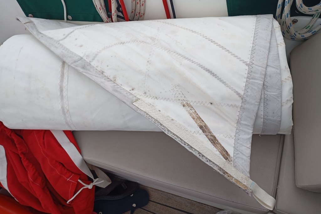 Sail finally arrived by courier, time to exit Labuan. Photo Ray Penson