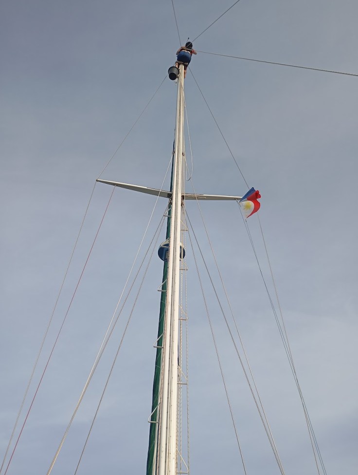 Jess fixing the windex that got messed up by birds. Photo Ray Penson