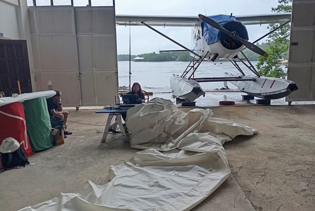 Improvised sail loft in the seaplane hanger. Photo Ray Penson