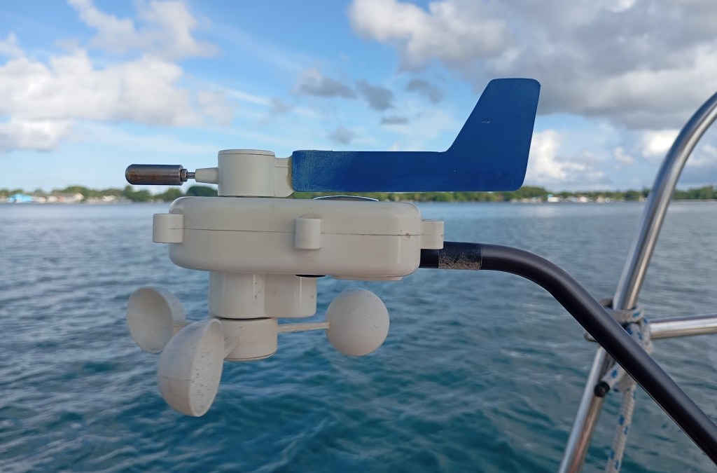 Broken Wind Direction indicator repaired with epoxy and a cut out plastic scraper. Photo Ray Penson