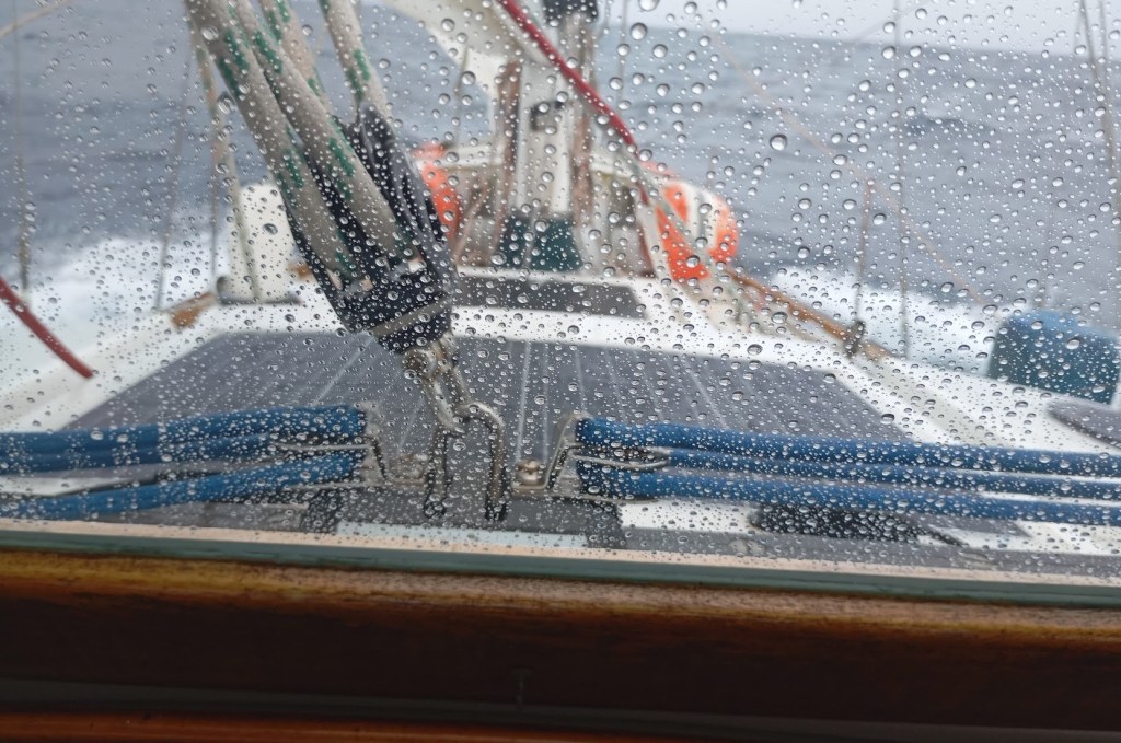 Pounding to weather, quite miserable but at least its not cold. Photo Ray Penson