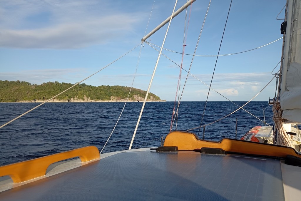 Departing PNG passing Cape St. George on the east of New Ireland. Photo Ray Penson